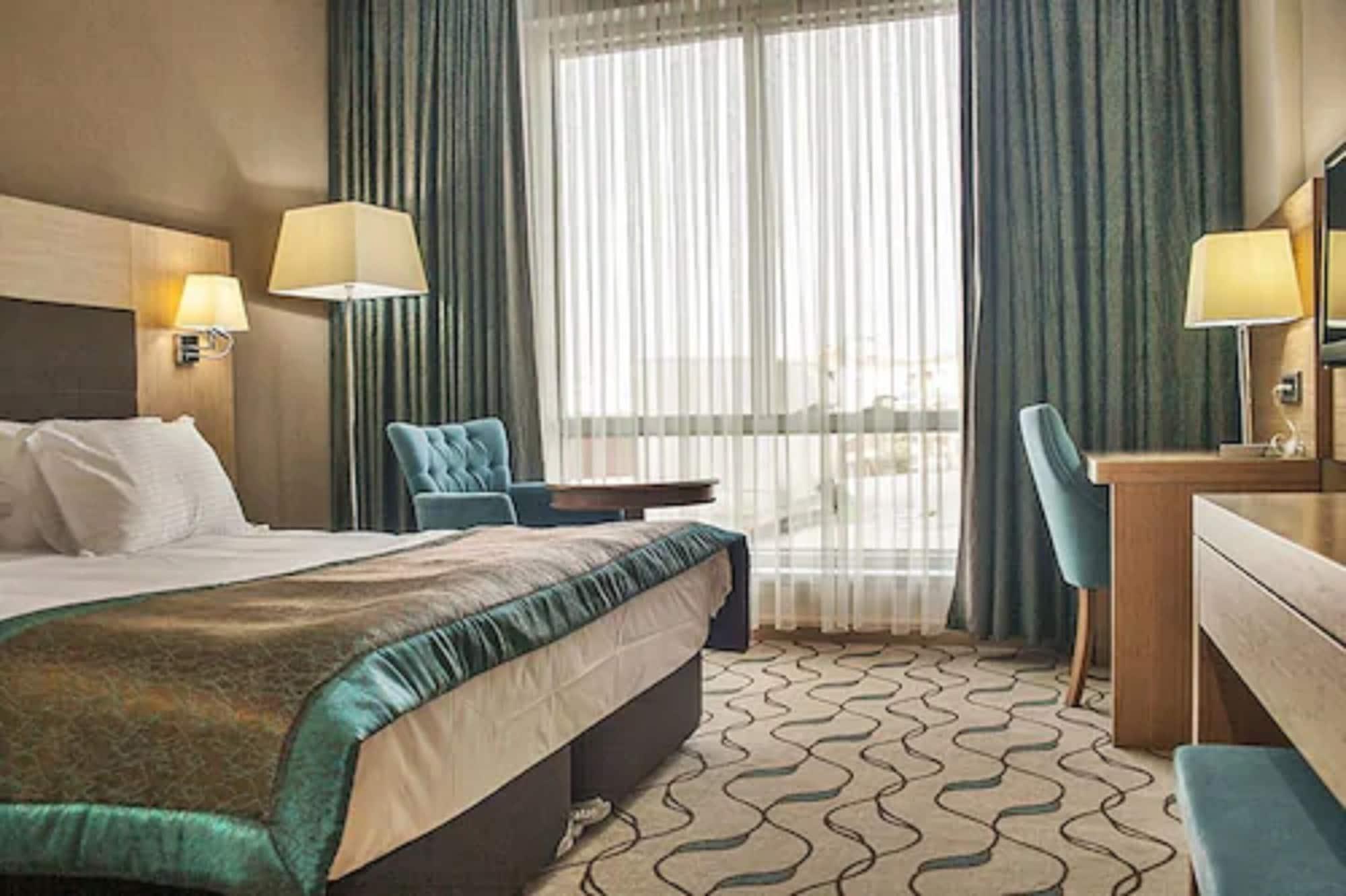 אודיירן Margi Hotel מראה חיצוני תמונה A room at the hotel