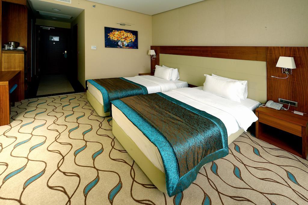 אודיירן Margi Hotel מראה חיצוני תמונה A room at the hotel