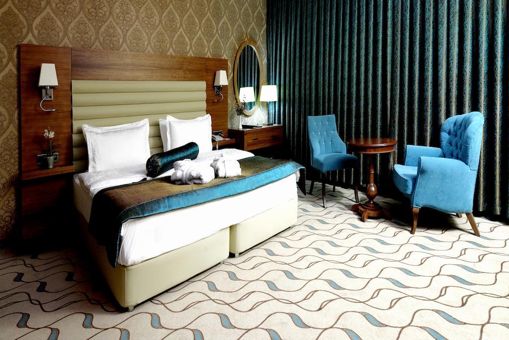 אודיירן Margi Hotel מראה חיצוני תמונה A bedroom at the hotel